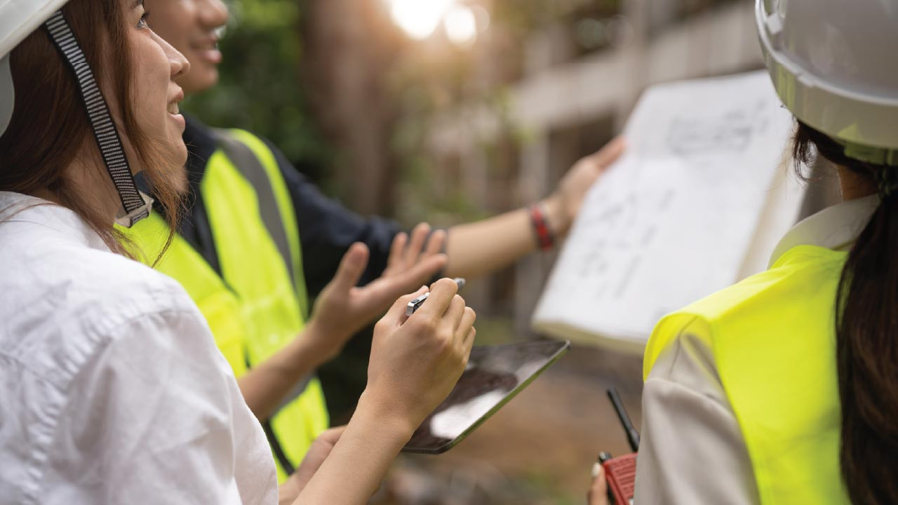 Community response team analyzing data on clipboard during training.