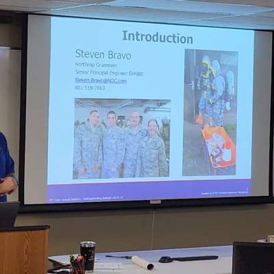 CE instructor presenting his PowerPoint in front of a class.