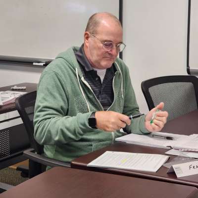 Continuing Education student practicing with a penetrometer.